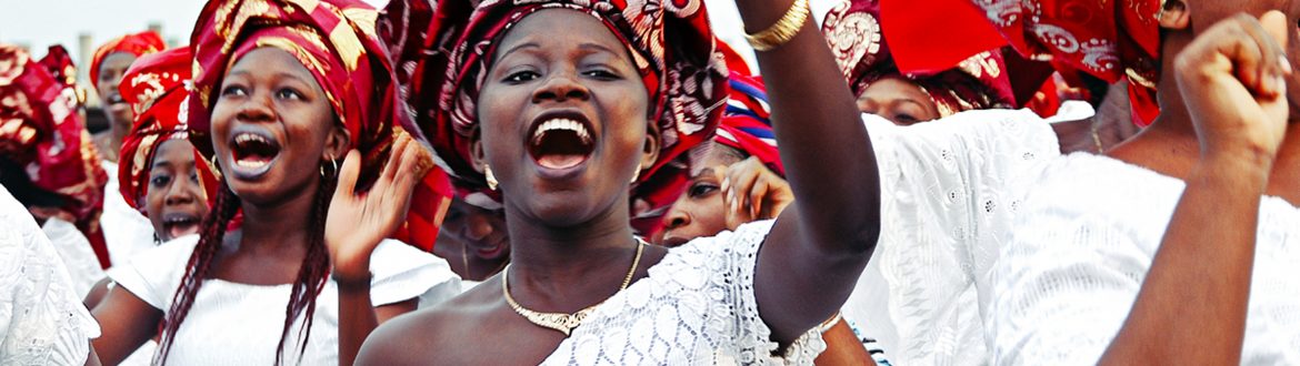 African women celebrating in traditional clothing